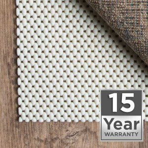 White grid-pattern rug pad with 15-year warranty